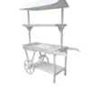 Charrette blanche Candy Bar avec roues et toit, disponible à la location pour une sweet table, un bar à bonbons ou une décoration événementielle.