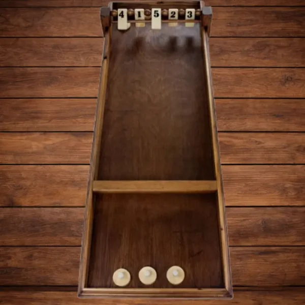 Jeu du Palet Clapet en bois vue de dessus avec palets, jeu d’adresse traditionnel en location Loiret Essonne Fontainebleau