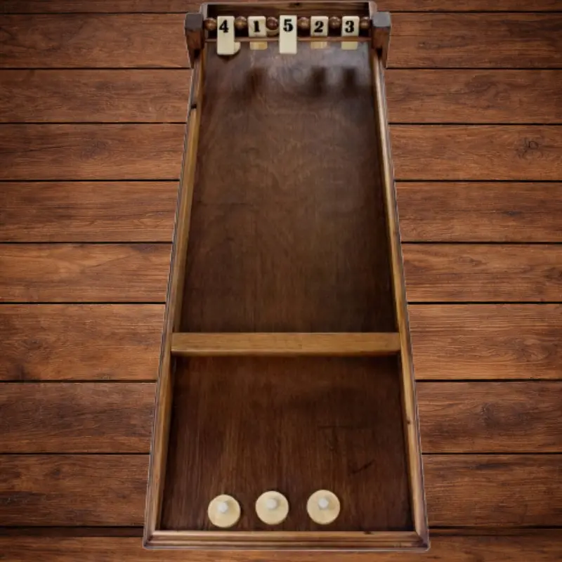 Jeu du Palet Clapet en bois vue de dessus avec palets, jeu d’adresse traditionnel en location Loiret Essonne Fontainebleau