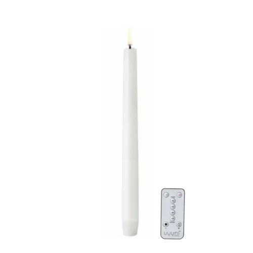 Bougie flambeau LED blanche haut de gamme allumée avec télécommande Uyuni.