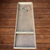 Jeu de pétanque palet en bois installé sur une table lors d’une animation conviviale pour un mariage ou un événement.